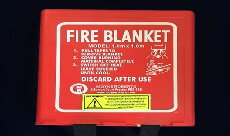 Fire Blanket with Warning Label
